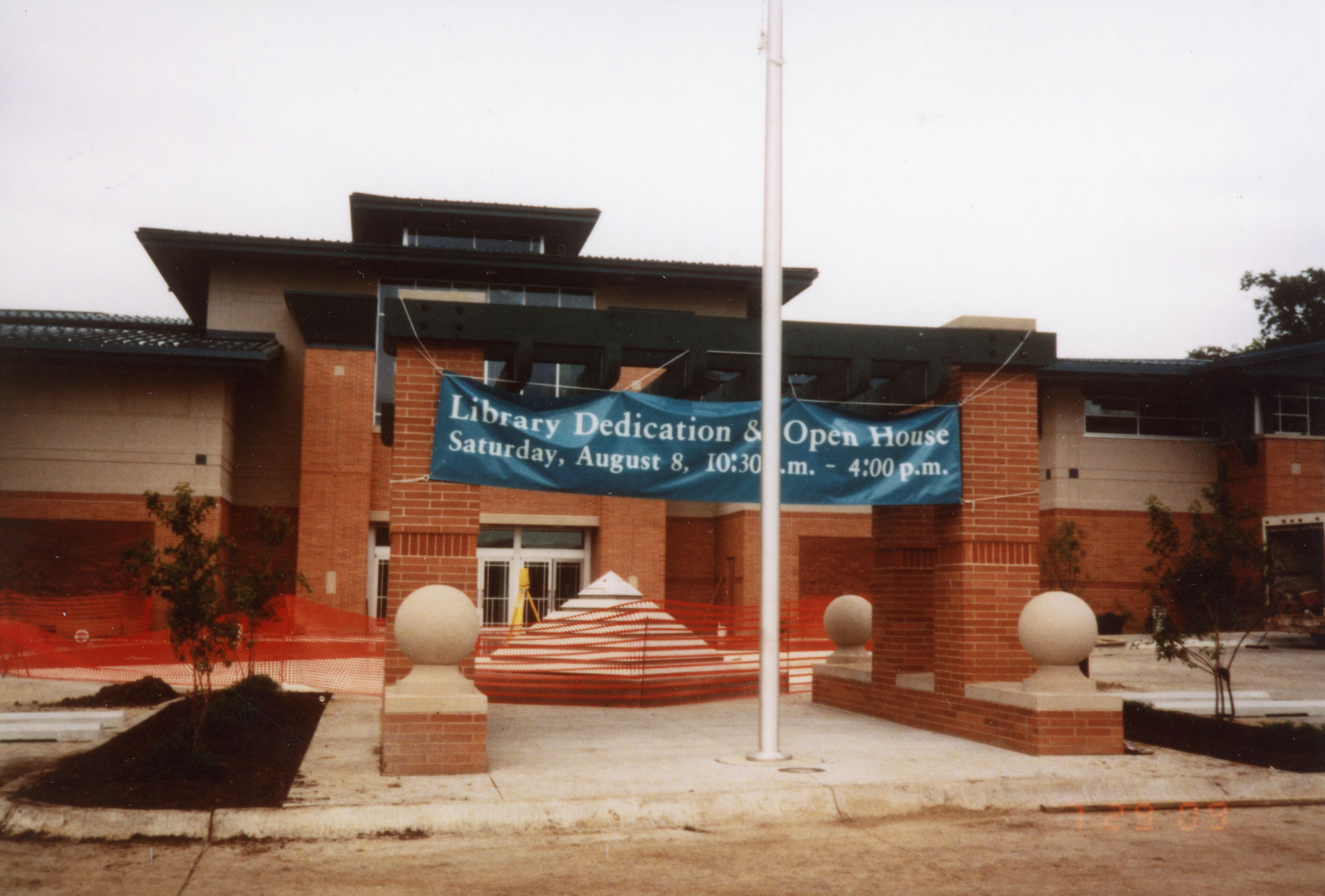 Open House banner in front of library