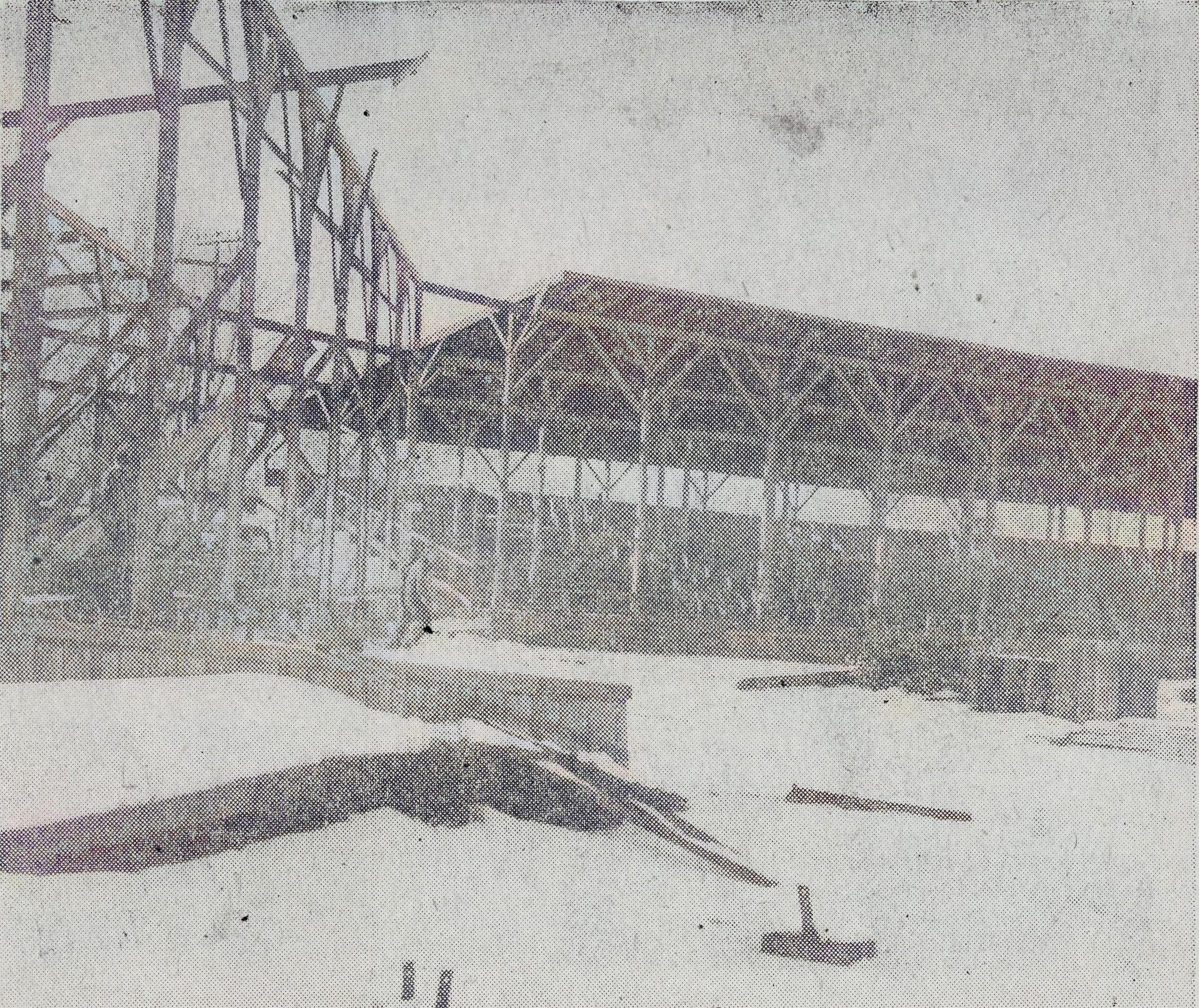 Photo of workers dismantling the grandstands at the American Legion Baseball Park in 1952