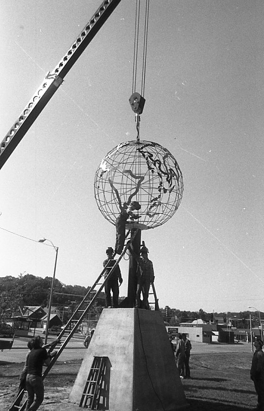 Installation of the "Globe of the World" sculpture, May 15, 1986