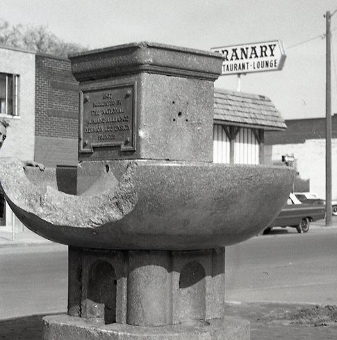 The damage to the water trough after an automobile hit it in March of 1971.