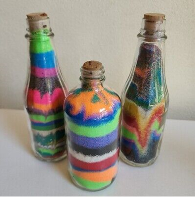 Colored sand in a bottle.