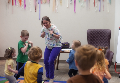 Anna dancing with kids.