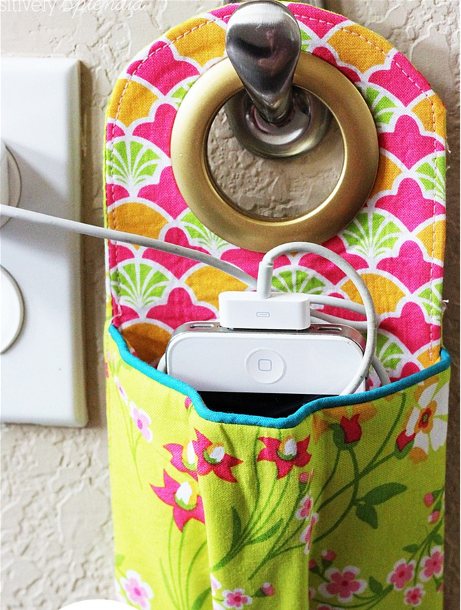 DIY charging station hanging on a hook with a cell phone