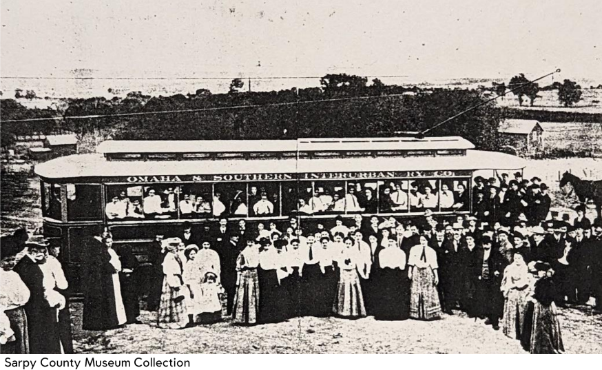 Photo of an Omaha & Southern Interurban Railway Co. streetcar with people posing in front of it